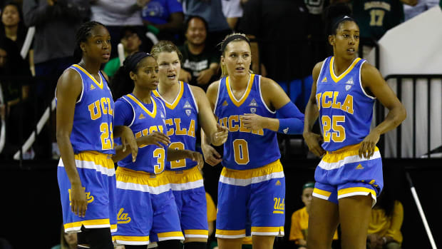 UCLA Bruins guard Kennedy Burke (22) and guard Jordin Canada (3) and guard Kari Korver (2) and guard Nicole Kornet (0) and forward Monique Billings